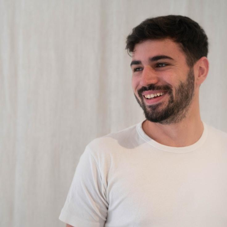 Kaveri Mehta, Lead Design Curator at Silk Lane Glen, reviewing corporate floral arrangements